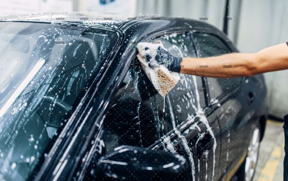 demo-attachment-1002-op_carwash-service-worker-soaps-glasses-A26XTPJ